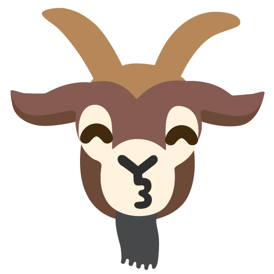 goat kissing smiling eyes