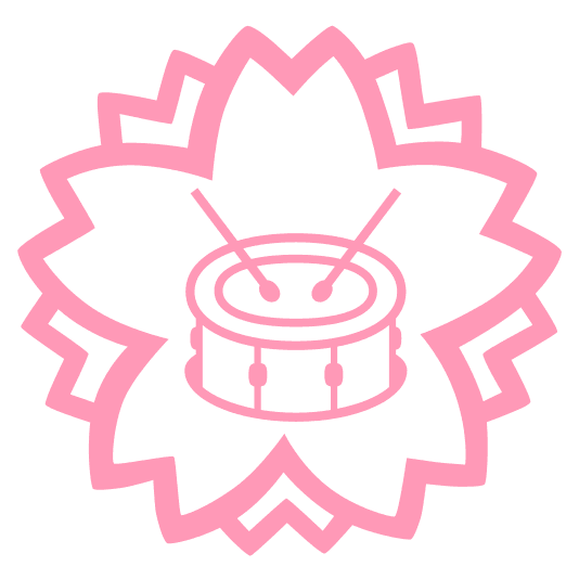 white flower drum with drumsticks